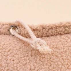 Bloque porte en bouclette beige
