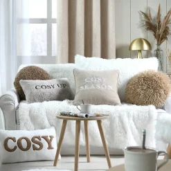 Coussin en polaire avec message brodé