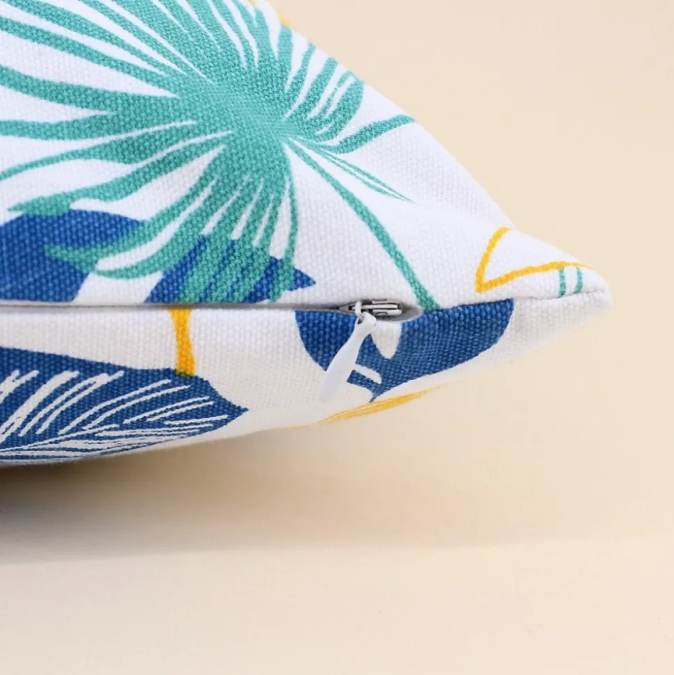 Coussin en tissu blanc motifs tropical 40x40cm
