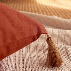 Coussin rectangulaire Panama avec 4 pompons en jute