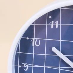 Horloge murale ronde bleu quadrillage blanc 25cm