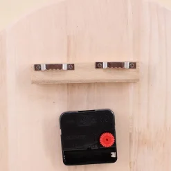 Horloge organique en bois 35x30cm