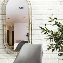 Miroir en métal ovale à suspendre