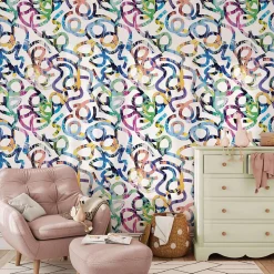 Papier peint pour enfants illustrant des confettis colorés - 510x260 cm (l x h)