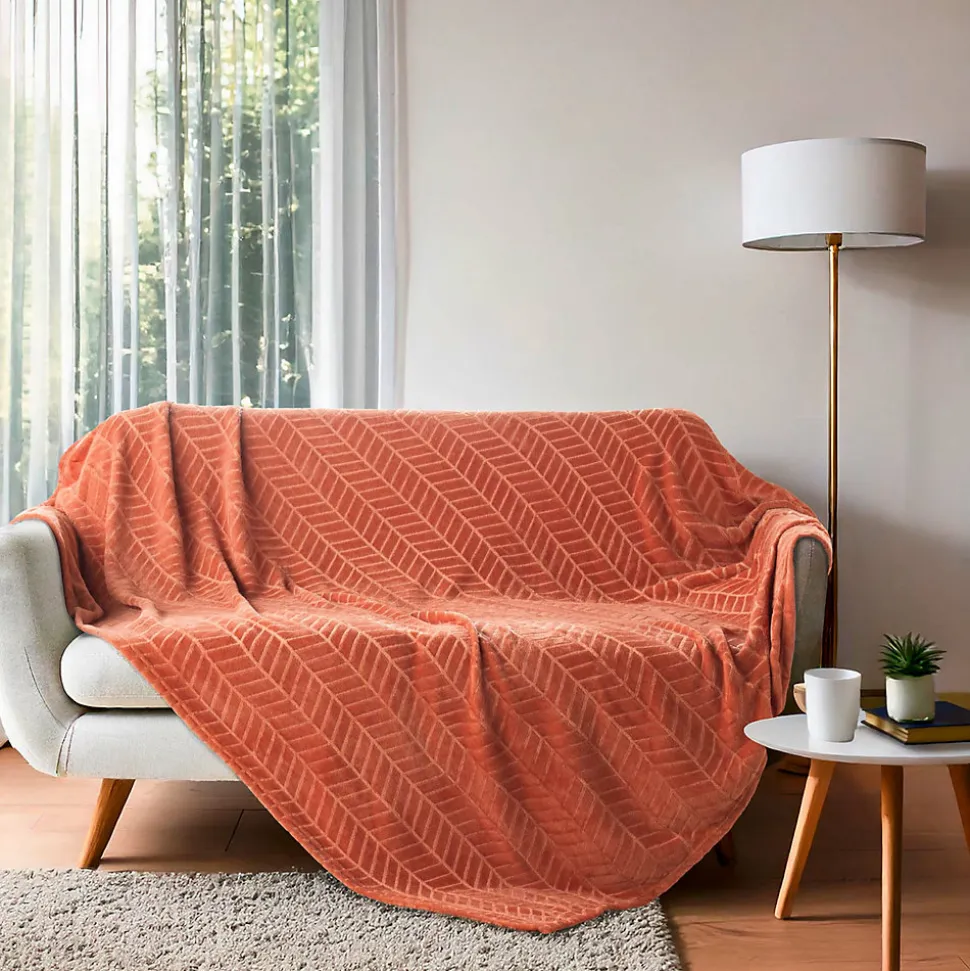 Plaid 180 x 220 cm en flanelle relief uni Modèle ARYA Coloris Terracotta