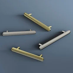 Poignée de meuble arrondi GoodHome Garlan aluminium effet laiton satin doré l.136mm x l.15mm x H. 27mm entraxe 96mm