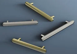 Poignée de meuble arrondi GoodHome Garlan aluminium effet laiton satin doré l.136mm x l.15mm x H. 27mm entraxe 96mm