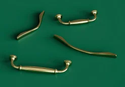 Poignée de meuble nœud GoodHome Ruis effet laiton doré l.137mm x l.10mm x H. 25mm entraxe 96mm