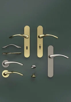 Poignée de meuble nœud GoodHome Ruis effet laiton doré l.137mm x l.10mm x H. 25mm entraxe 96mm