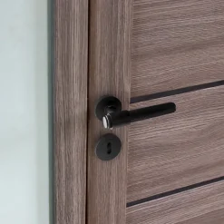 Poignées de porte sur rosace ronde noir mat industriel - Modèle Ema Trou de clé L