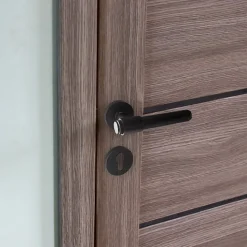 Poignées de porte sur rosace ronde noir mat industriel - Modèle Ema Trou de cylindre i