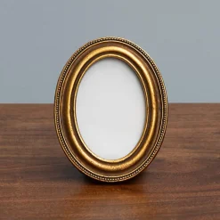 Porte photo ovale doré 12x9x9cm