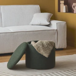 Pouf kaki foncé en tissu avec rangement pour coussins ou plaids
