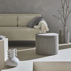 Pouf taupe en tissu avec rangement pour coussins ou plaids