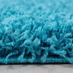 Tapis poils longs shaggy tissé motif uni UNI L, Turquoise