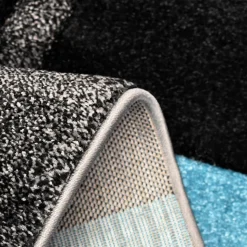 Tapis pour une chambre ou une entrée tissé motif géométrique VIRGULADA, bleu