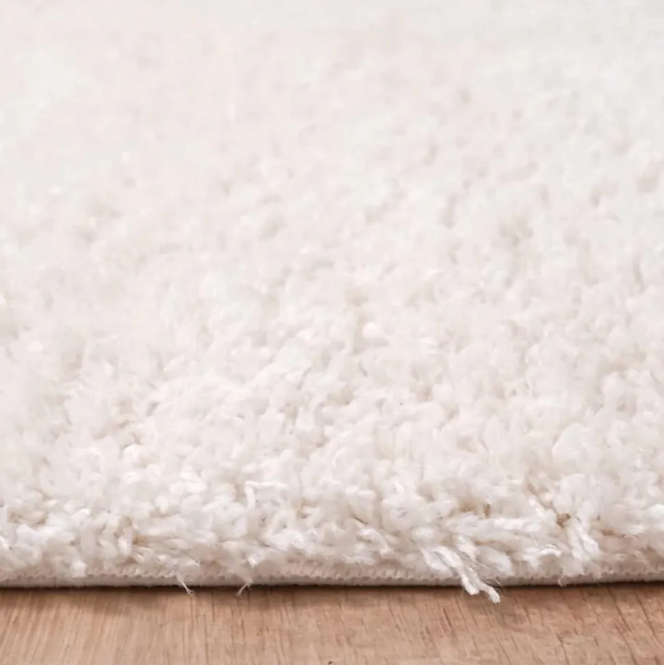 Tapis shaggy tissé motif uni LYN4 UNILA, crème